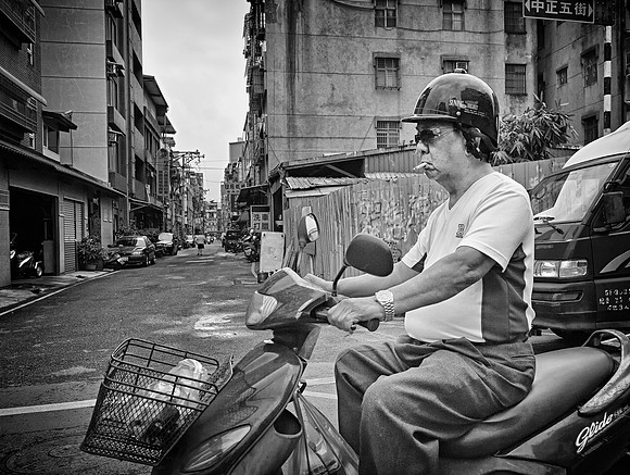 Smoking Man Riding Scooter, by Dean Chiang, Xyclopx